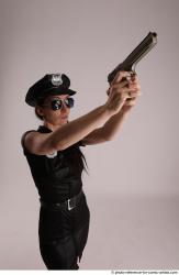 NIKITA STANDING POSE WITH GUN